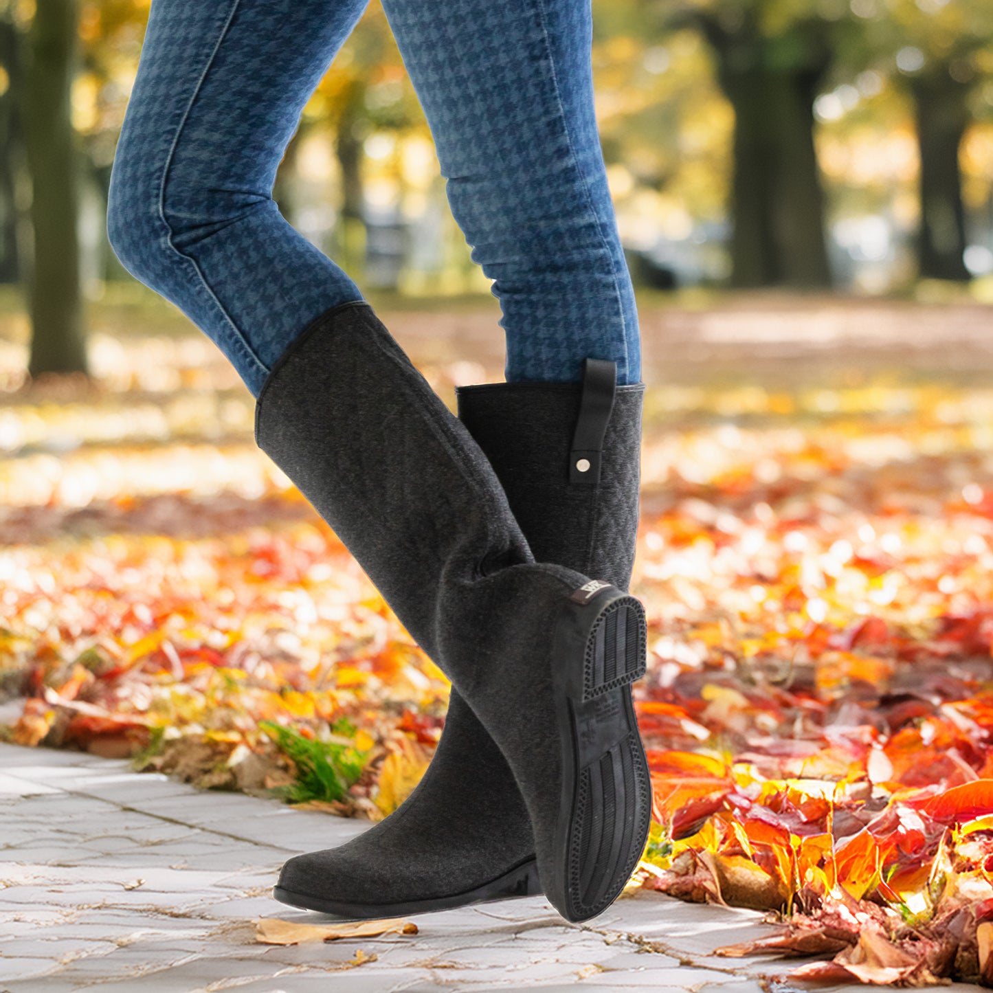 A lightweight pair of womens waterproof riding boots, perfect for rainy days and equestrian style.